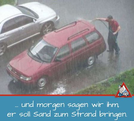 Mann-wäscht-Auto-im-Regen.jpg